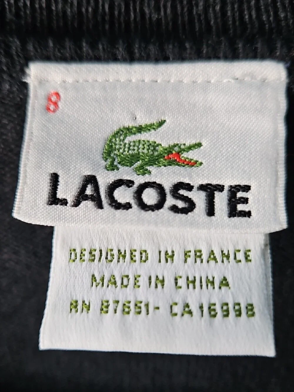Lacoste Men’s Black, Cream & Red Argyle V-Neck Sweater